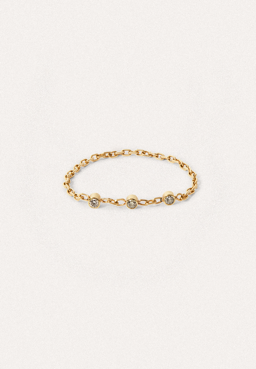 Chapter V — Motion Chain Ring with three Round Brown Diamonds
